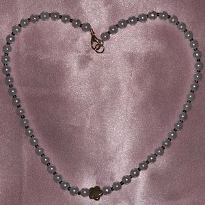 The cutest pearl flower necklace in brown!